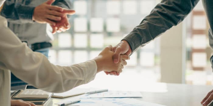 news-businessmen-shake-hands-after-a-deal