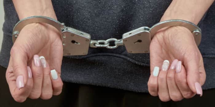 news-woman-in-handcuffs-arrested