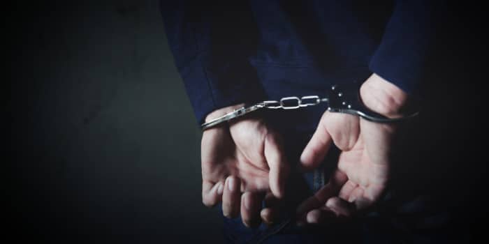 news-arrested-man-with-handcuffs