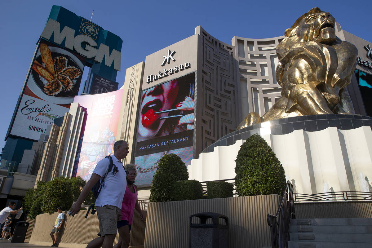 Visitors to the Las Vegas Strip pass MGM Grand on Wednesday, Aug. 4, 2021. The megaresort is pa ...