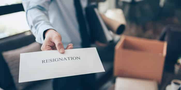 businessman-hands-in-resignation-letter-exit-quit-resign-leave-depart-news