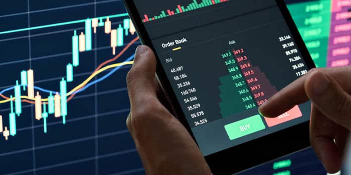 person-purchases-shares-stock-market-news